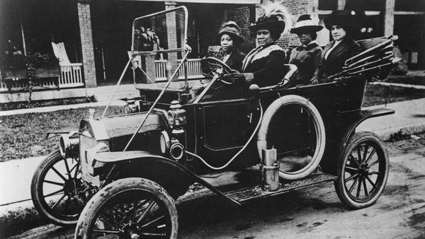 Old-fashioned black and white car: transportation.