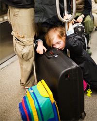 一个疲惫的旅行者”width=