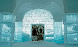 Ice hotels feature beds, but you'll still be in your sleeping bag in the wintertime.