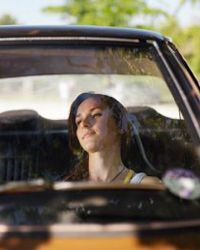 Woman sitting in car