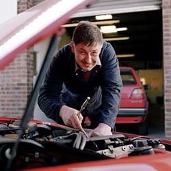 Man fixing his engine