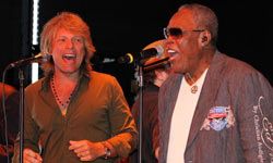 Jon Bon Jovi (left) performs with Sam Moore during the Apollo In The Hamptons fundraiser in August 2010 in East Hampton, New York.