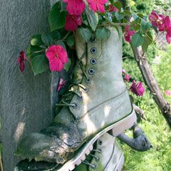 Old work boots make ideal outdoor planters.