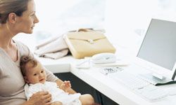 Woman in office with baby