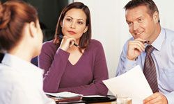 Man and woman conducting interview