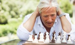 Frustrated man playing chess