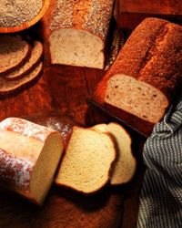 Which has lower calories: white bread or wheat bread?