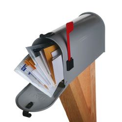 Mailbox stuffed full of bills