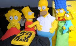 &quot;The Simpsons&quot; paved the way for many adult cartoons to come. Here, the characters celebrate at a 20th-anniversary party.