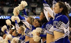 Cheerleaders, such as this squad from Duke University at a 2011 basketball game, help add to the excitement of sports, even for those watching the game on TV.