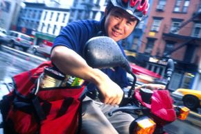 The good times: Joseph Park, Kozmo.com CEO, making a delivery via moped in New York City in late 1999.