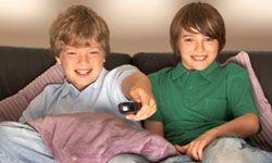 tween boys watching TV