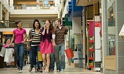 tweens walking through the mall