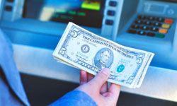 Depositing cash directly into an ATM allows banks to reuse the bills that same day.