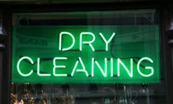 flourescent dry cleaning sign