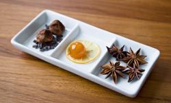 Chocolate truffles with candied kumquat and star anise, a spice that tastes similar to regular anise.