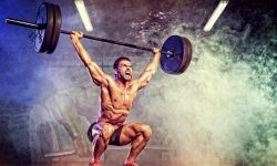 Athletic man doing weightlifiting