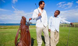 father and son on golf course