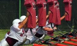 football players practicing tackles