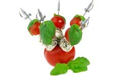 Tomatoes can be used to make all kinds of pretty garnishes. See pictures of international tomato dishes.