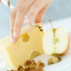 A few slices of cheese, a piece of fruit and a handful of nuts is a nutritious and filling snack for both kids and adults.