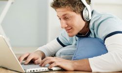 Man with headphones and laptop