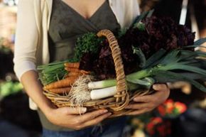 woman with basket of vegetables