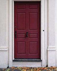 stately front door with white pediment