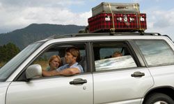 Family driving with windows open