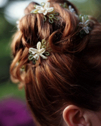 A high-placed chignon is a classic bridal hairdo option. 