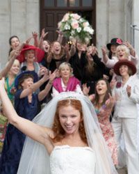 bride tossing bouquet