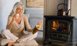 Heating your most-used rooms with a fireplace can help you lower your energy bill.