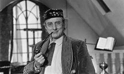 Comedian Spike Milligan as Dr. Strabismus on the 1960s BBC series &quot;World of Beachcomber.&quot;