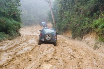 Mud-slinging off-road adventure outdoors.