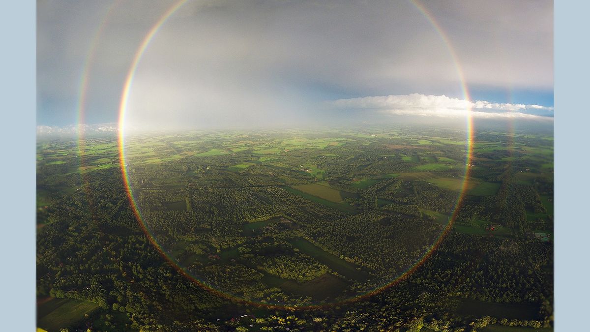 full rainbows in the sky