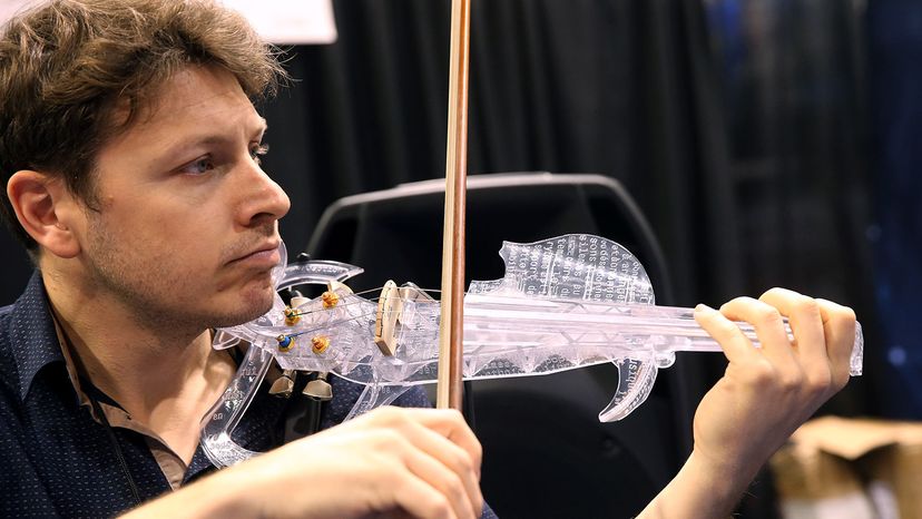 3D printed violin being played by Laurent Bernadac.