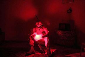 Soldier with flashlight