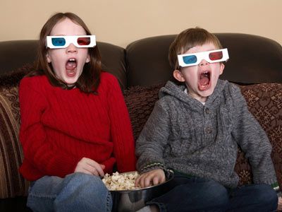 Kids wearing 3d anaglyph glasses