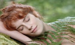 woman sleeping with fern