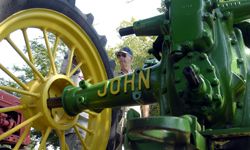 David Bunning looks over his 1936 John Deere tractor during the 15th Arkansas Antique Tractor and Engine Show, in Scott, Ark.