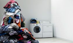Front-loading washers will help you keep organized, but finding a spot to store your dirty laundry is still up to you.