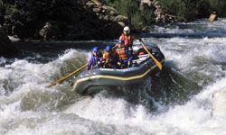 Some rafters ride Kern River's rapids in California. 