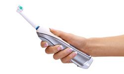 The large handle of an electric toothbrush is easier to grip than a traditional skinny toothbrush.