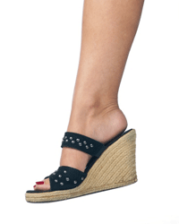 Wedge sandals are still hip (though studded black leather is not usually seen as cutting-edge fashion). 