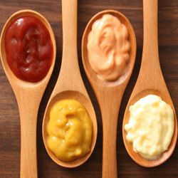 condiments in spoons