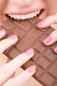 woman eating chocolate