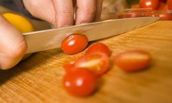 chopping tomatoes