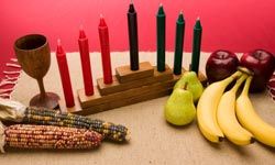 Kwanzaa candles with fruit and vegetables