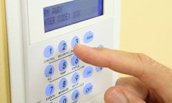 A well-advertised alarm system may deter a thief from entering your home.