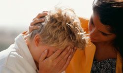 Woman consoling distressed friend